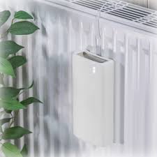 Com Four® Humidificateur Chauffage - Améliorez votre Confort Intérieur